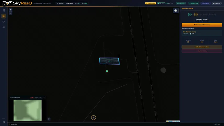 SkyResQ ground control station: a dark mission map with the search area plotted, a live camera feed inset, and the mission planner panel on the right